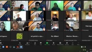 A screen shot of a group of people in a video conference.
