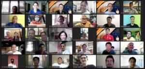 A group of people in a video conference.
